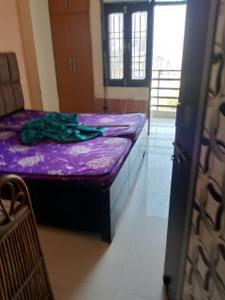 Bedroom Image of 850 Sq.ft 2 BHK Builder Floor for rent in Sector 62A Noida for Rs. 22000