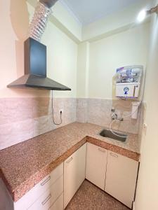 Kitchen Image of 860 Sq.ft 1 BHK Builder Floor for rent in Sector 39 Gurgaon for Rs. 22000