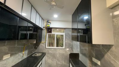 Kitchen Image of 800 Sq.ft 2 BHK Apartment / Flat for sale in Dharti Lotus Arshabharat, Goregaon West Mumbai for Rs. 21000000