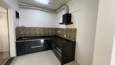 Kitchen Image of 1460 Sq.ft 3 BHK Apartment / Flat for sale in Abhinav Pebbles Urbania, Bavdhan Pune for Rs. 12600000