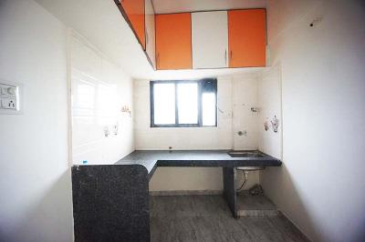 Kitchen Image of 731 Sq.ft 1 BHK Apartment / Flat for sale in Manjari Budruk Pune for Rs. 2300000