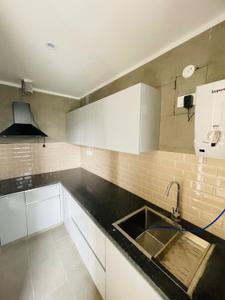 Kitchen Image of 750 Sq.ft 1 BHK Builder Floor for rent in Sector 46 Gurgaon for Rs. 32000