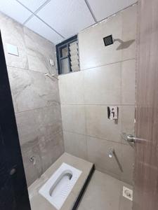 Bathroom Image of 824 Sq.ft 3 BHK Apartment / Flat for sale in Ashwamegh Elite, Sargasan Gandhinagar for Rs. 7900000