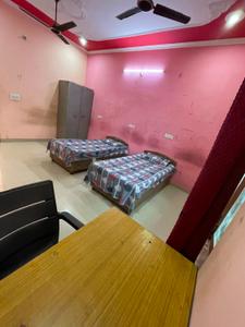 Bedroom Image of Omjee Paying Guest in Garhi Cantt, Dehradun