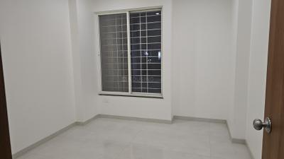 Bedroom Image of 1012 Sq.ft 2 BHK Apartment / Flat for sale in Kosmic Kourtyard Phase 2, Wagholi Pune for Rs. 5800000