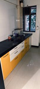 Kitchen Image of 555 Sq.ft 1 BHK Apartment / Flat for rent in Kashish Park, Dharamveer Nagar Thane for Rs. 30000