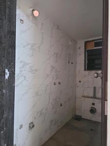 Common Bathroom One Image of 867 Sq.ft 1 BHK Apartment / Flat for sale in Rajhans Moonstone, Vasai West Vasai for Rs. 6950000