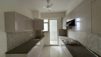 Kitchen Image of 1050 Sq.ft 2 BHK Apartment / Flat for rent in Godrej Woods, Sector 43 Noida for Rs. 52000