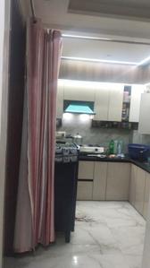 Kitchen Image of 550 Sq.ft 2 BHK Apartment / Flat for rent in Dwarka Mor New Delhi for Rs. 23000