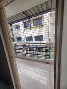 Balcony Image of 600 Sq.ft 1 BHK Apartment / Flat for rent in Sai Raj Residency, Pimple Gurav Pune for Rs. 20000