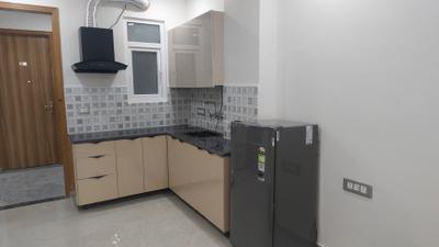 Kitchen Image of 1000 Sq.ft 1 BHK Builder Floor for rent in Sector 14 Gurgaon for Rs. 34500