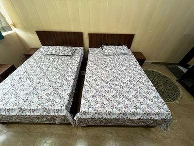 Bedroom Image of Girls PG, Arun Vihar, Contact 98189 33548 in Sector 37, Noida