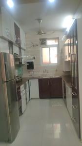 Kitchen Image of 950 Sq.ft 2 BHK Apartment / Flat for rent in CGHS Rail Vihar, Sector 15 Gurgaon for Rs. 42000