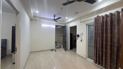 Living Room Image of 1075 Sq.ft 2 BHK Apartment / Flat for rent in Gaur City 7th Avenue, Noida Extension Greater Noida for Rs. 26000