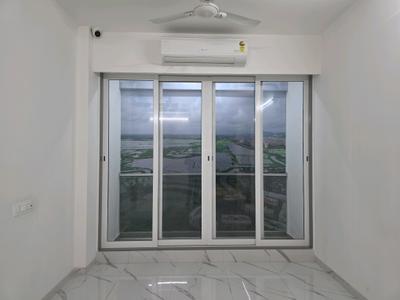 Living Room Image of 1014 Sq.ft 2 BHK Apartment / Flat for sale in Mansarovar Pearl Gardens, Vasai West Vasai for Rs. 6880000