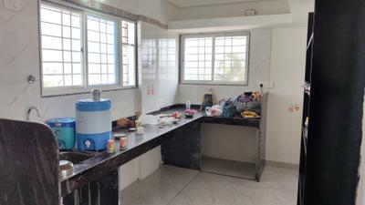 Kitchen Image of 850 Sq.ft 2 BHK Apartment / Flat for rent in Loni Kalbhor Pune for Rs. 11000