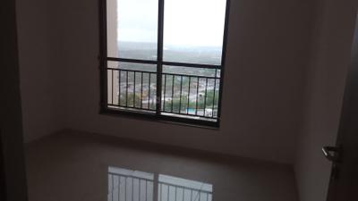 Bedroom Image of 910 Sq.ft 2 BHK Apartment / Flat for rent in Manhattan, Charholi Budruk Pune for Rs. 32000