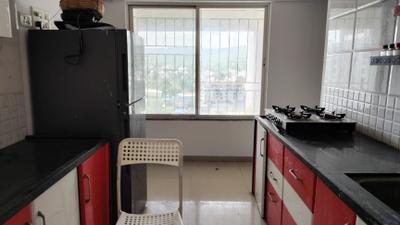 Kitchen Image of 850 Sq.ft 2 BHK Apartment / Flat for rent in Sree Little Hearts, Undri Pune for Rs. 23000