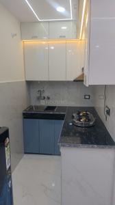 Kitchen Image of 550 Sq.ft 1 BHK Apartment / Flat for rent in Dwarka Mor New Delhi for Rs. 18000