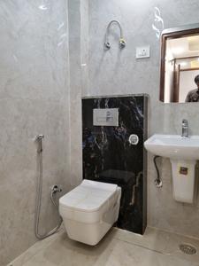 Common Bathroom Image of 600 Sq.ft 2 BHK Apartment / Flat for sale in Hans Builders Floor, Dwarka Mor New Delhi for Rs. 3800000
