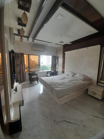 Punam Apartment Bedroom 1