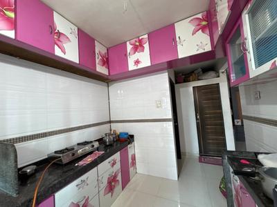 Kitchen Image of 735 Sq.ft 1 BHK Apartment / Flat for sale in Manohar Vikas Shreeji Paraiso Phase 2, Badlapur East Badlapur for Rs. 3500000