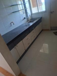 Kitchen Image of 1280 Sq.ft 2 BHK Apartment / Flat for rent in Pramukh Sahaj, Chala Vapi for Rs. 11000