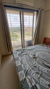 Bedroom Image of 550 Sq.ft 1 BHK Apartment / Flat for rent in Arihant Aarohi, Shilgaon Thane for Rs. 20000