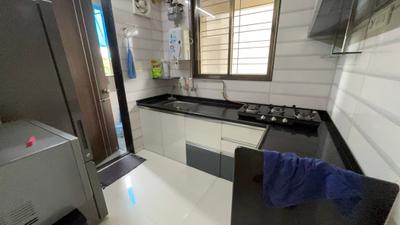 Kitchen Image of 1050 Sq.ft 2 BHK Apartment / Flat for rent in Suyog Space, Wakad Pune for Rs. 39500