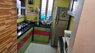 Kitchen Image of 927 Sq.ft 2 BHK Apartment / Flat for sale in Swaraj Planet, Kopar Khairane Navi Mumbai for Rs. 13500000