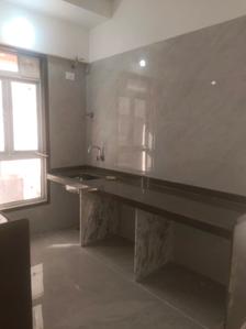 Kitchen Image of 645 Sq.ft 2 BHK Apartment / Flat for sale in Digam Poonam CHSL, Borivali East Mumbai for Rs. 17900000