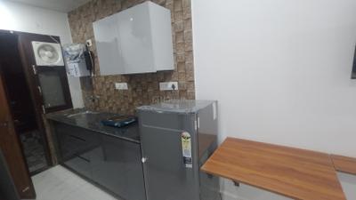 Kitchen Image of 600 Sq.ft 1 RK Builder Floor for rent in Sector 31 Gurgaon for Rs. 24000