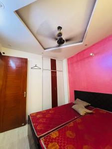 Bedroom Image of 500 Sq.ft 1 BHK Builder Floor for rent in Dwarka Mor New Delhi for Rs. 12500