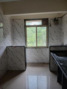 Kitchen Image of 695 Sq.ft 1 BHK Apartment / Flat for rent in Mohan Palms, Badlapur East Badlapur for Rs. 9000