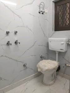 Common Bathroom Image of 1125 Sq.ft 3 BHK Apartment / Flat for sale in Vikaspuri New Delhi for Rs. 15500000