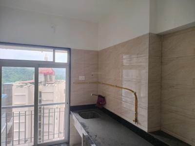 Kitchen Image of 700 Sq.ft 1 BHK Apartment / Flat for rent in Puraniks Rumah Bali, Kasarvadavali Thane for Rs. 17000
