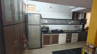 Kitchen Image of 1350 Sq.ft 3 BHK Apartment / Flat for sale in Sun Breeze Tower, Memnagar Ahmedabad for Rs. 8500000