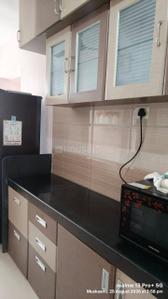 Kitchen Image of 1000 Sq.ft 2 BHK Apartment / Flat for rent in Vardhaman Heights Phase2, Rahatani Pune for Rs. 32000
