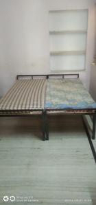 Bedroom Image of Arushi Shivam Boys Hostel in Mansarovar, Jaipur