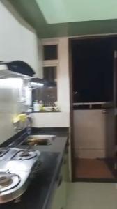 Kitchen Image of 760 Sq.ft 2 BHK Apartment / Flat for rent in Rising Kohinoor Emerald, Sus Pune for Rs. 30000