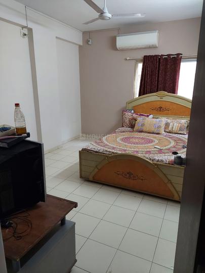 Poojan Apartment Bedroom 1