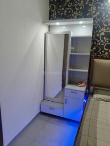 Bedroom Image of 700 Sq.ft 2 BHK Builder Floor for rent in Guru Ji Delhi Residency, Dwarka Mor New Delhi for Rs. 19400