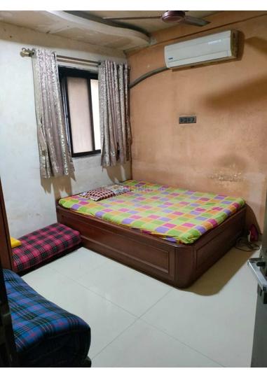 Meghdoot Apartment Bedroom 1