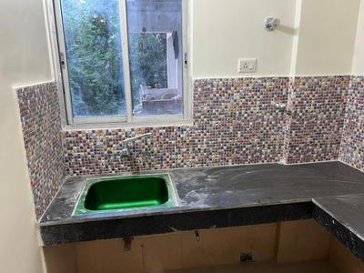 Kitchen Image of 1166 Sq.ft 3 BHK Apartment / Flat for sale in Tirupati Paradise, Rajpur Kolkata for Rs. 4000000