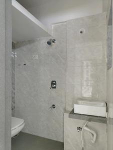 Common Bathroom Image of 670 Sq.ft 1 BHK Apartment / Flat for sale in Rajhans Moonstone, Vasai West Vasai for Rs. 6800000