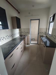Kitchen Image of 570 Sq.ft 1 BHK Apartment / Flat for rent in Mahindra Happinest Tathawade, Tathawade Pune for Rs. 21000