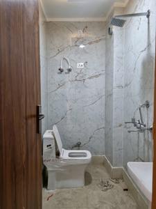 Common Bathroom Image of 600 Sq.ft 2 BHK Apartment / Flat for sale in Dwarka Mor New Delhi for Rs. 3500000