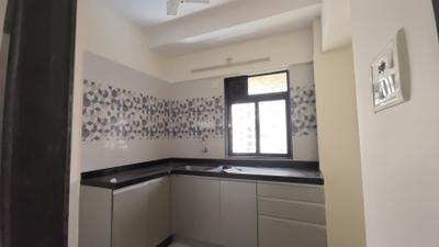 Kitchen Image of 800 Sq.ft 1 BHK Apartment / Flat for sale in Raunak City, Kalyan West Kalyan for Rs. 4000000
