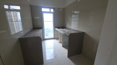 Kitchen Image of 830 Sq.ft 2 BHK Apartment / Flat for rent in Suswagatam CHS Adityaraj Landmark, Vikhroli East Mumbai for Rs. 59500