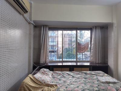 Bedroom Image of 652 Sq.ft 1 BHK Apartment / Flat for rent in Kopar Khairane Navi Mumbai for Rs. 30000